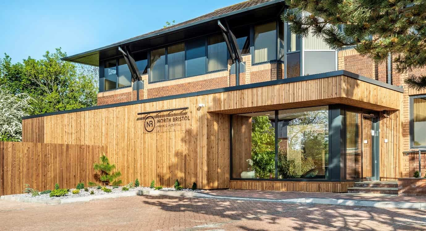 the beautiful exterior of North Bristol Private Hospital lit by the summer sunshine